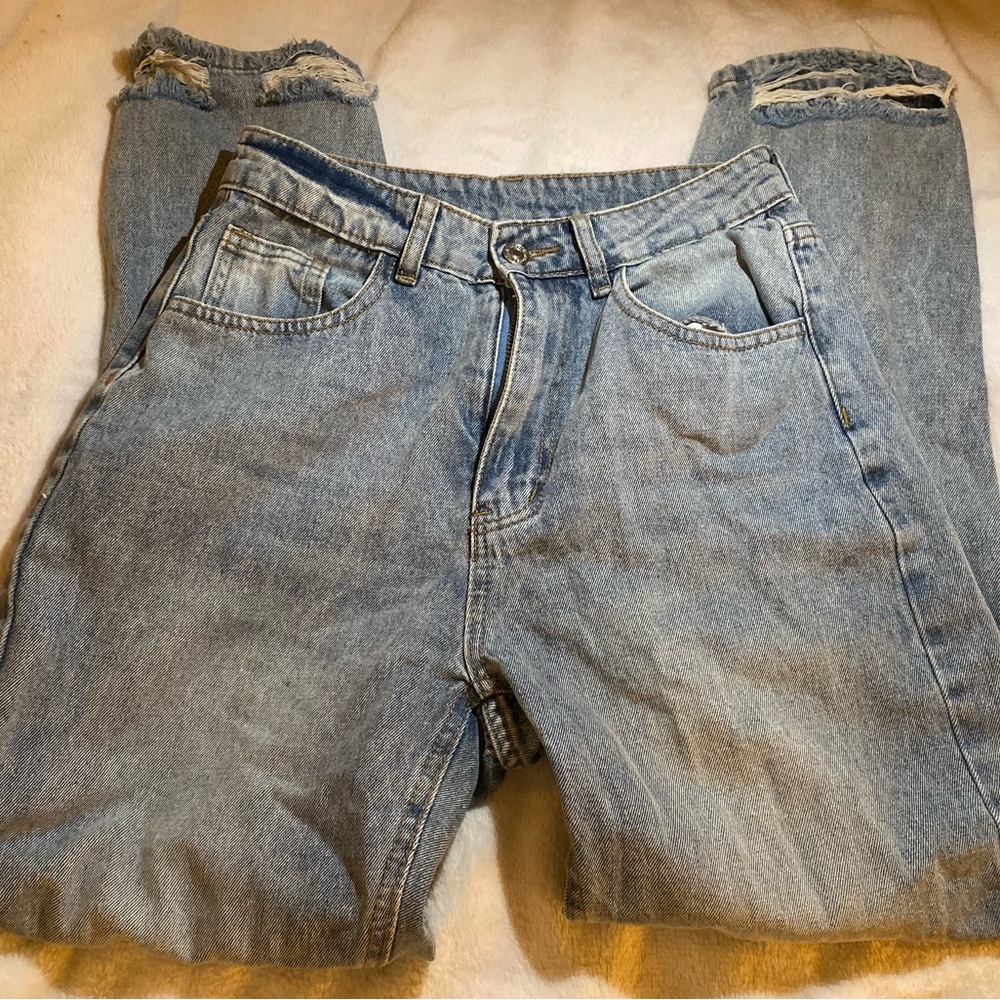 Distressed ripped jeans